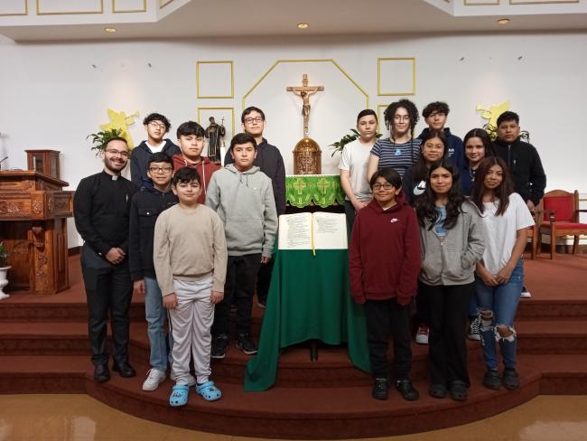 Teen First Holy Communion with Fr. Jorge and Ana Morales .jpg